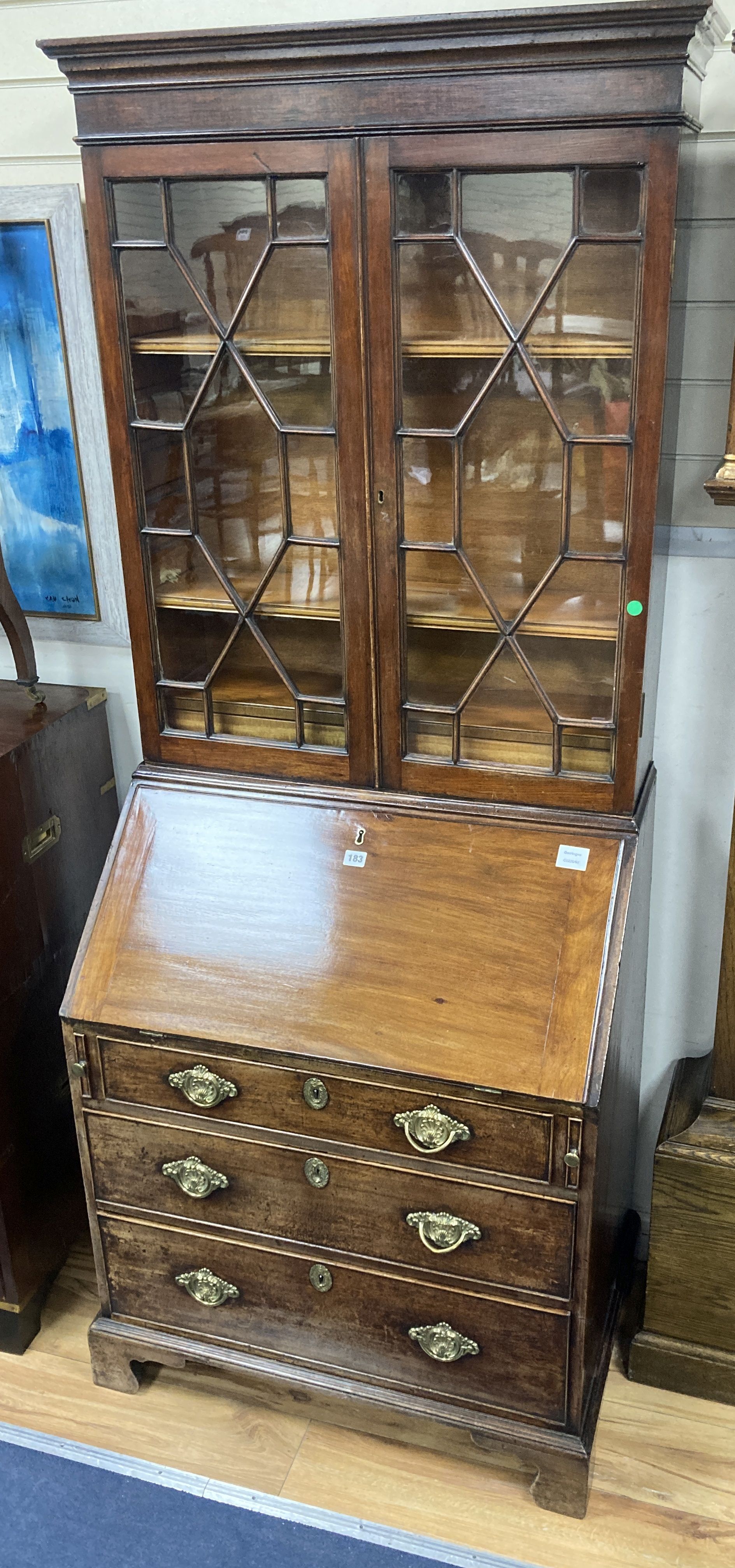 A small George III and later mahogany bureau bookcase, width 76cm, depth 50cm, height 192cm